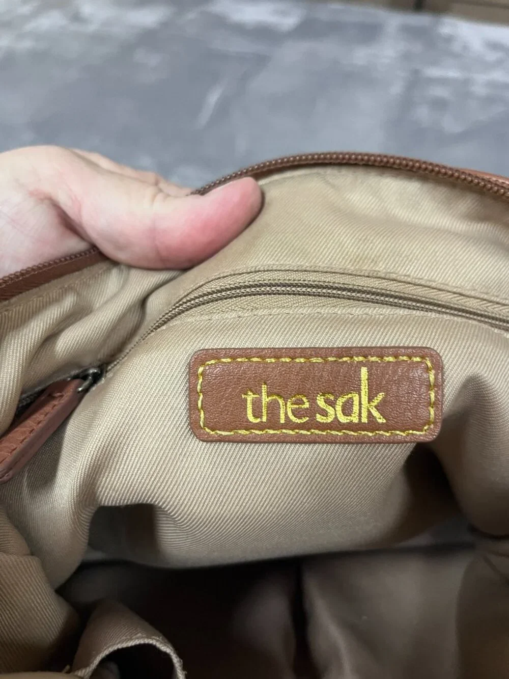 The Sak Navy Nylon Crossbody Bag with Brown Accents